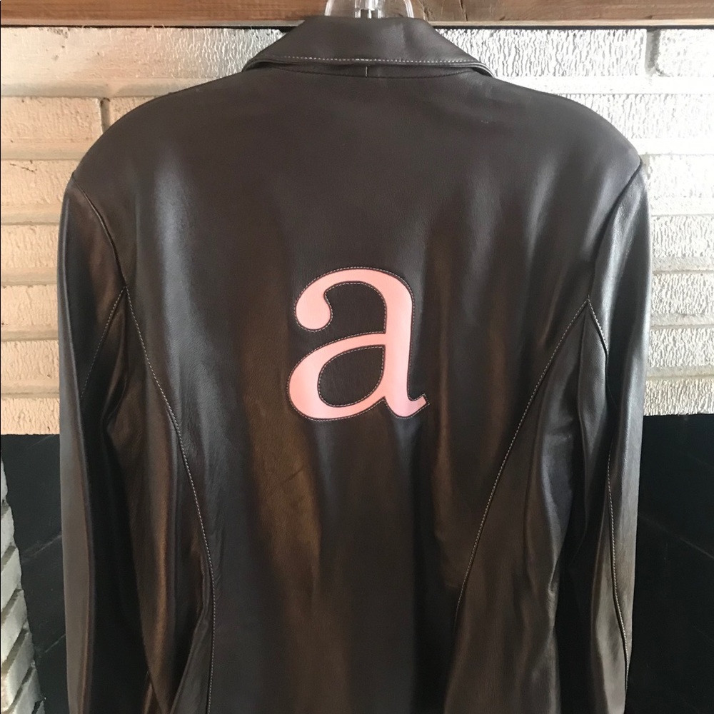 chocolate brown leather blazer with pink a on back